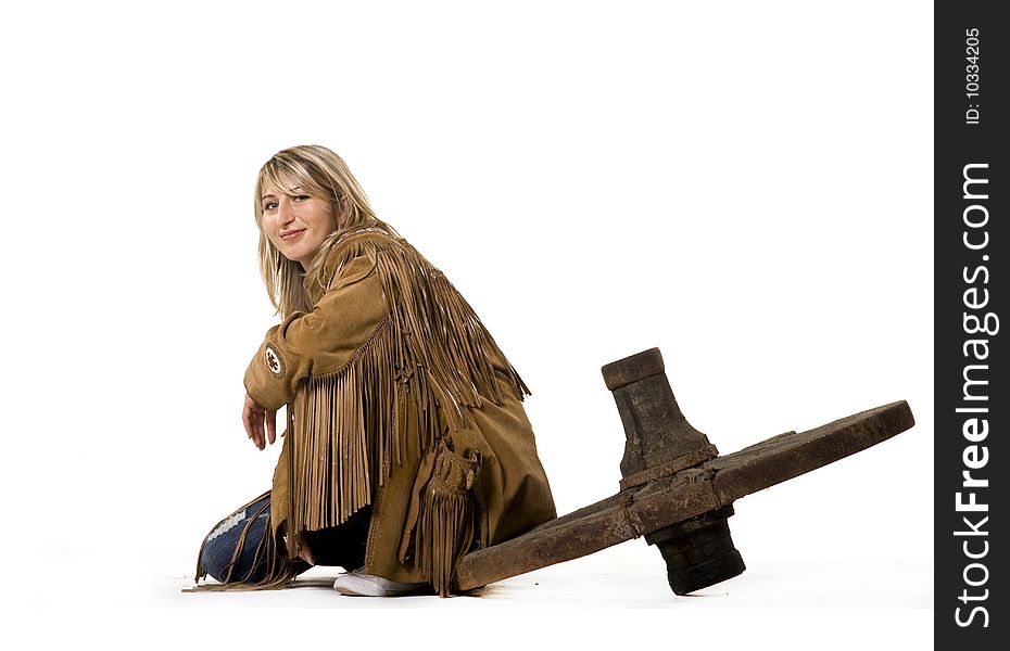 cow girl sitting on cart wheel. cow girl sitting on cart wheel