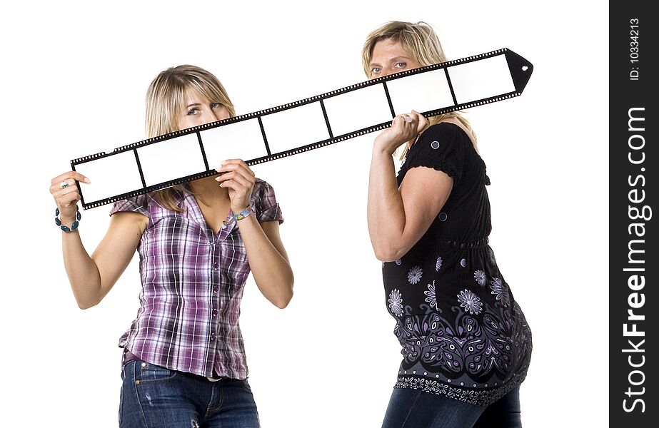 Mother and daughter holding blank film strip