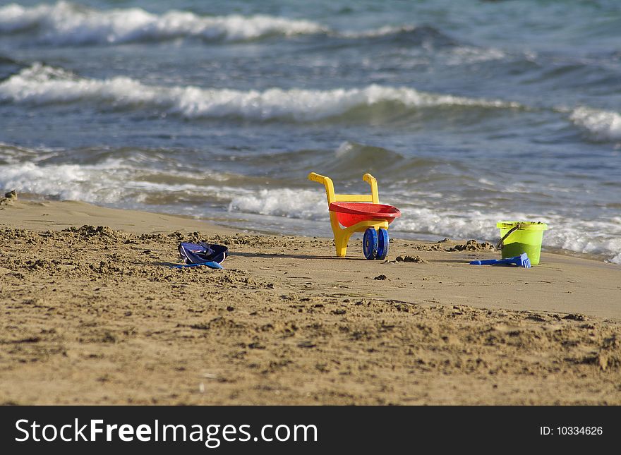 Three lost Toys on the Beach