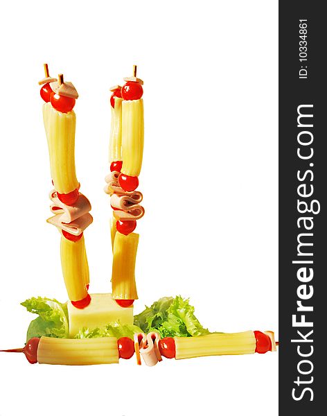 Macaroni with ham and cherry tomatoes on skewer