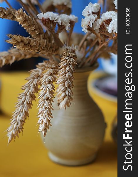 Decorative vase with dried wheat