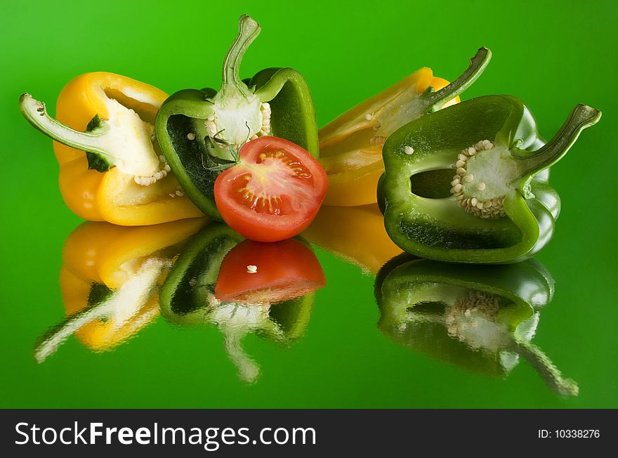 Vivid still life with pepper and tomato. Vivid still life with pepper and tomato