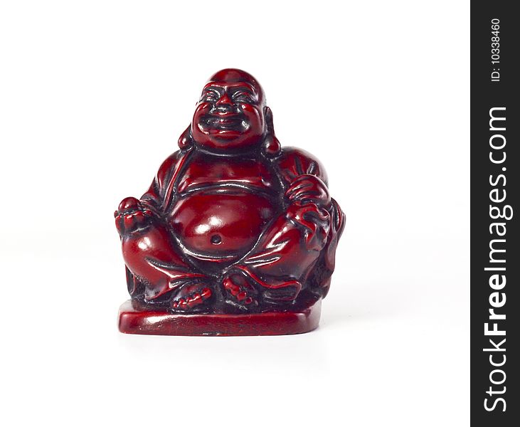 Buddha sitting cross-legged with sphere and box.
