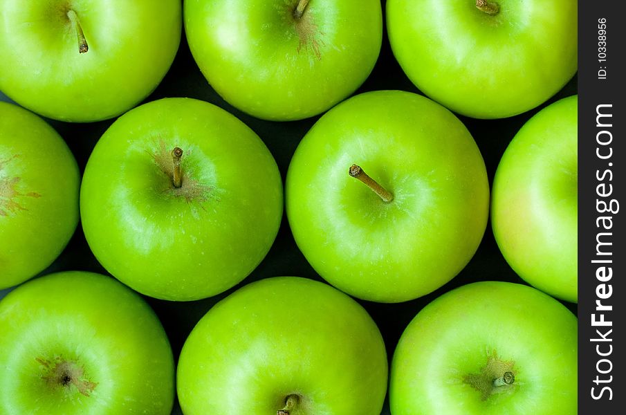 Green granny smith apples background closeup. Green granny smith apples background closeup