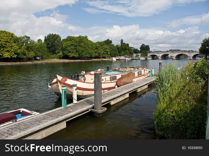 A houseboat moored on the River Thames