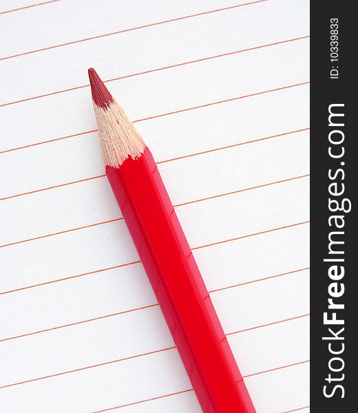 Red pencil with blank notepad page. Red pencil with blank notepad page