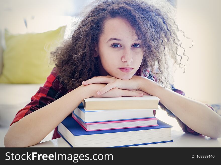 Teen Girl Resting On Books