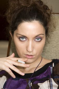 Young Woman With Cigarette Stock Photography