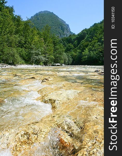 Beautiful golden  water of river Rakitnica,  Bosnia and Herzegovina