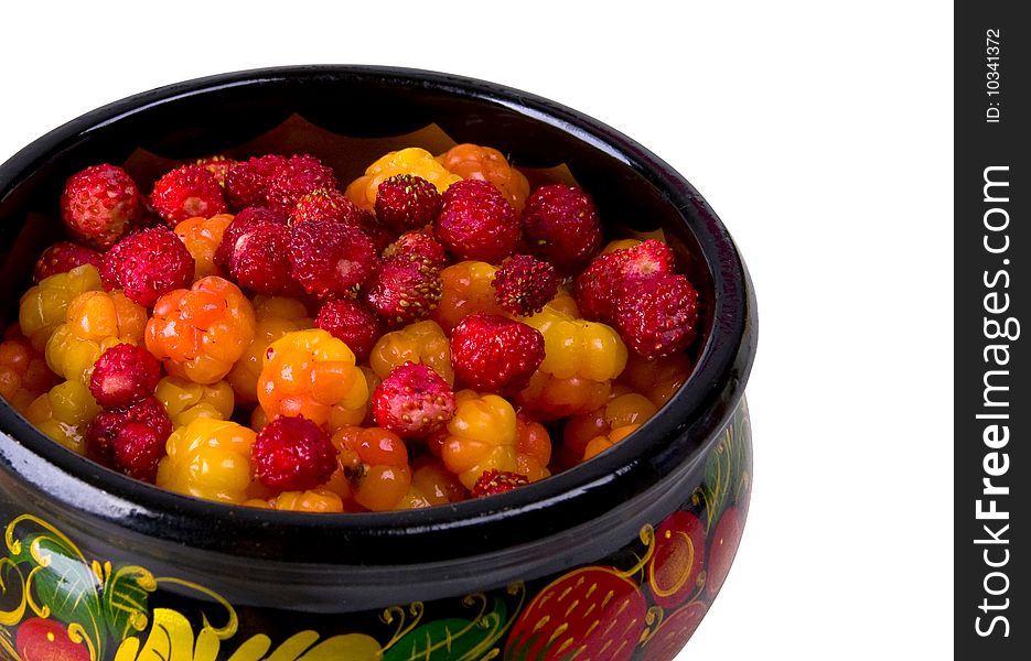 Strawberries and cloudberries in Khokhloma bowl