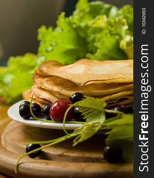 Pancakes with cherries and currants. Pancakes with cherries and currants