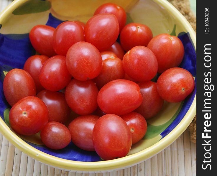 Some sweet cocktail tomatoes in a bowl