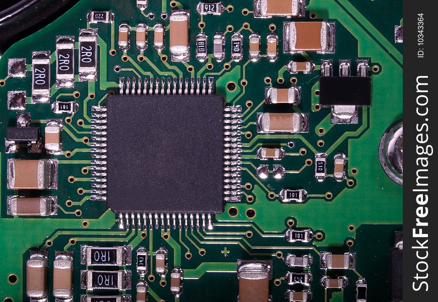 A close up of a green computer circuit. A close up of a green computer circuit.