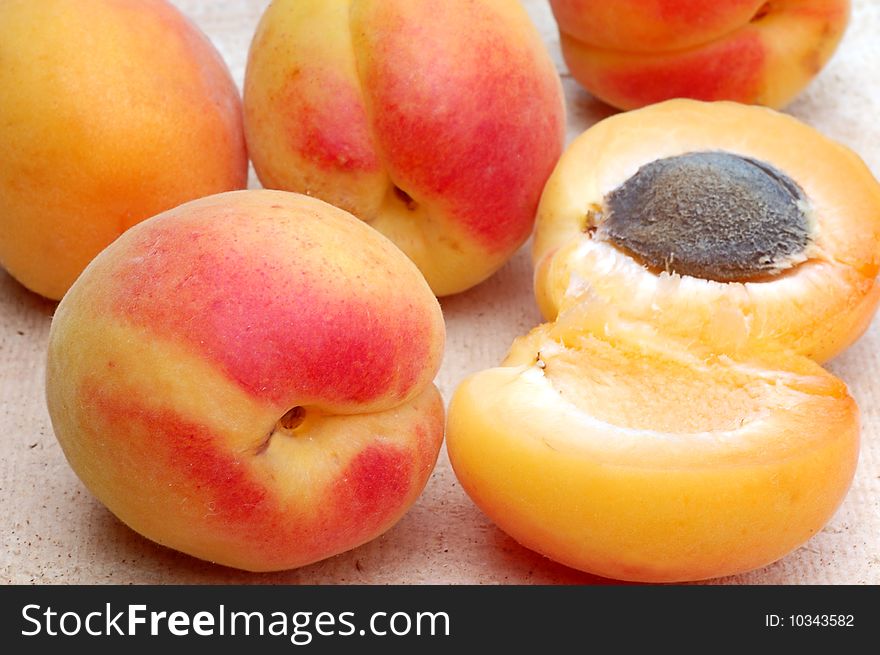 Some juicy ripe peaches close up