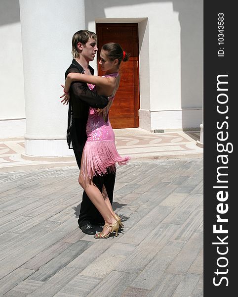 Man and girl dancing outdoor. Man and girl dancing outdoor