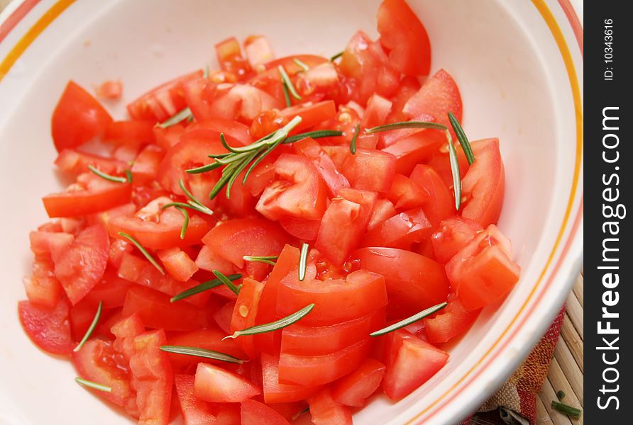 A fresh salad of tomatoes with rosemary