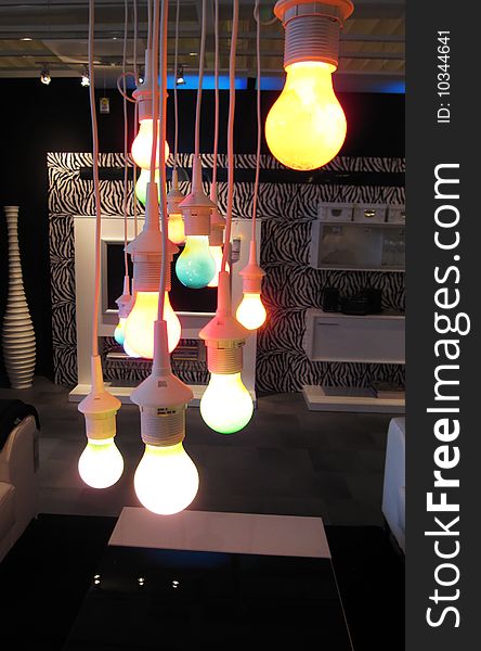 Many modern colored lights with white sockets