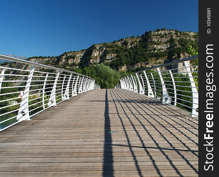 Bridge across river Sarca in Torbole, Trentino, Italy