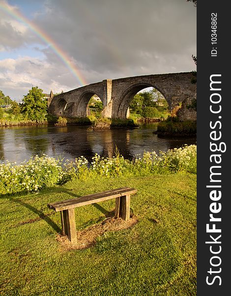 The ancient medieval bridge at Stirling captured in the soft light of early morning with a rainbow in the background. The ancient medieval bridge at Stirling captured in the soft light of early morning with a rainbow in the background.