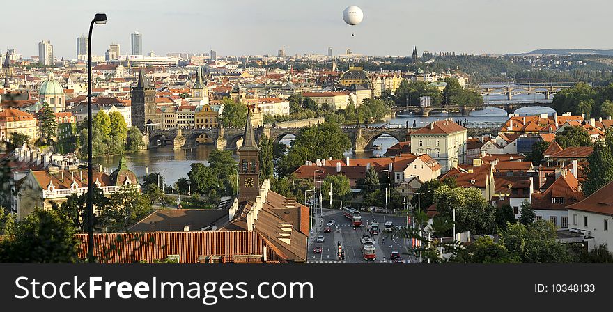 Old Prague Bridges Panorama and a white balloon at the sky
