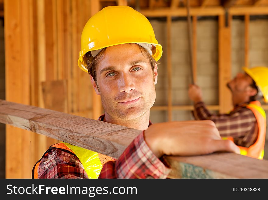 A Construction Worker on the job with a hard hat