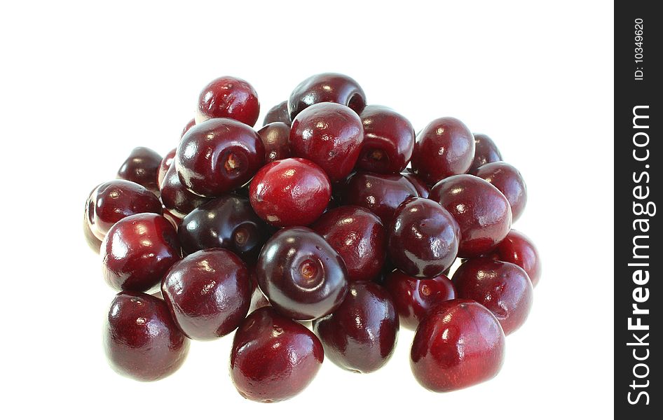 Red sweet cherry on a white background, it is isolated.