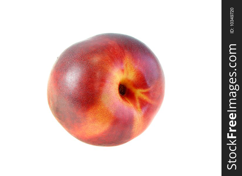 The ripe red peach on a white background, is isolated.
