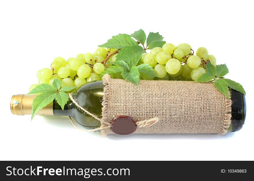 White wine and grapes on a white background, it is isolated.