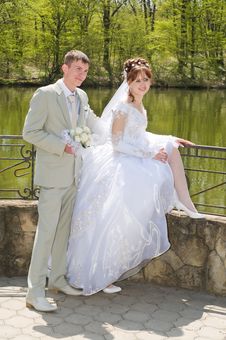 The Groom And The Bride On Lake. Royalty Free Stock Photo The Groom And The Bride On Lake. Royalty Free Stock Photo