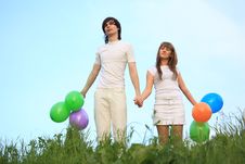 Girl And Guy Stand With Balloons In Hands Royalty Free Stock Photo Girl And Guy Stand With Balloons In Hands Royalty Free Stock Photo