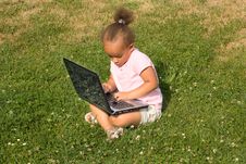 Beautiful Young Mixed Race Girl Using Laptop Royalty Free Stock Images