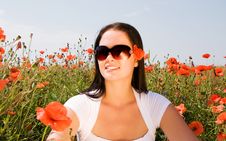 Young Beautiful Woman In Poppy Flowers Royalty Free Stock Images