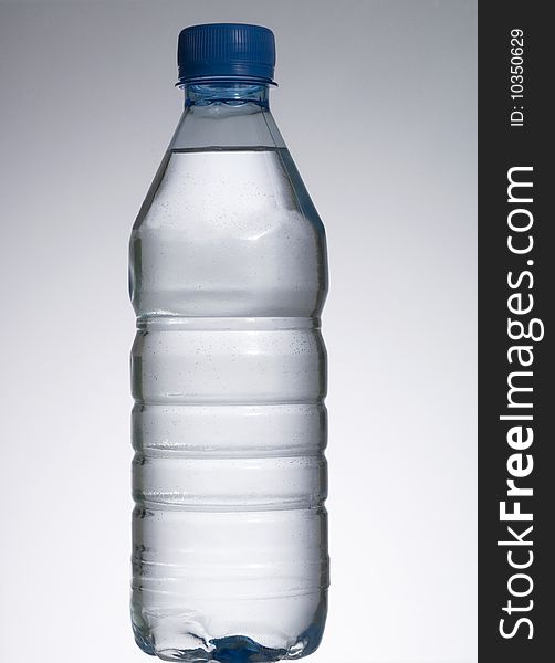 Bottled water isolated over a white background