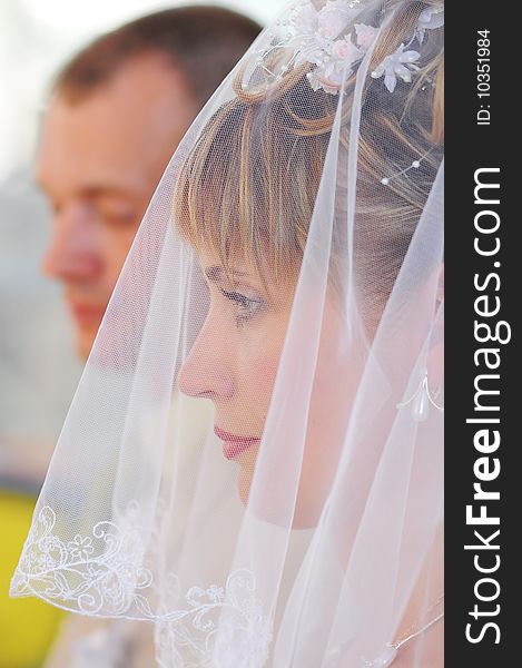 The groom and the bride during marriage ceremony in orthodox church. The groom and the bride during marriage ceremony in orthodox church.