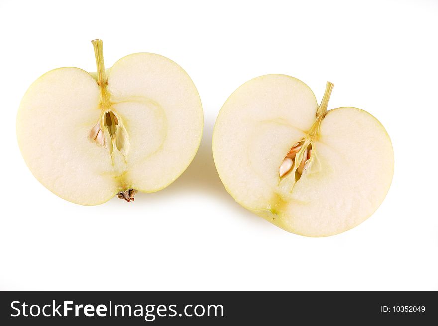 Cut green apple on a white background