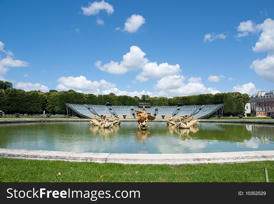 Classic fountain in paris royal park Versailles with water reflection. Classic fountain in paris royal park Versailles with water reflection