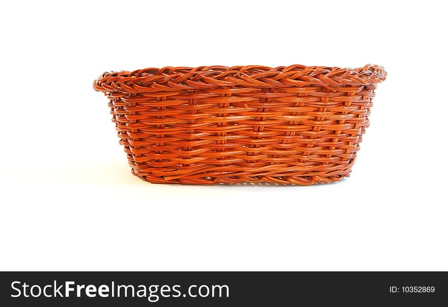 Orange wicker basket without handles side view isolated. Orange wicker basket without handles side view isolated