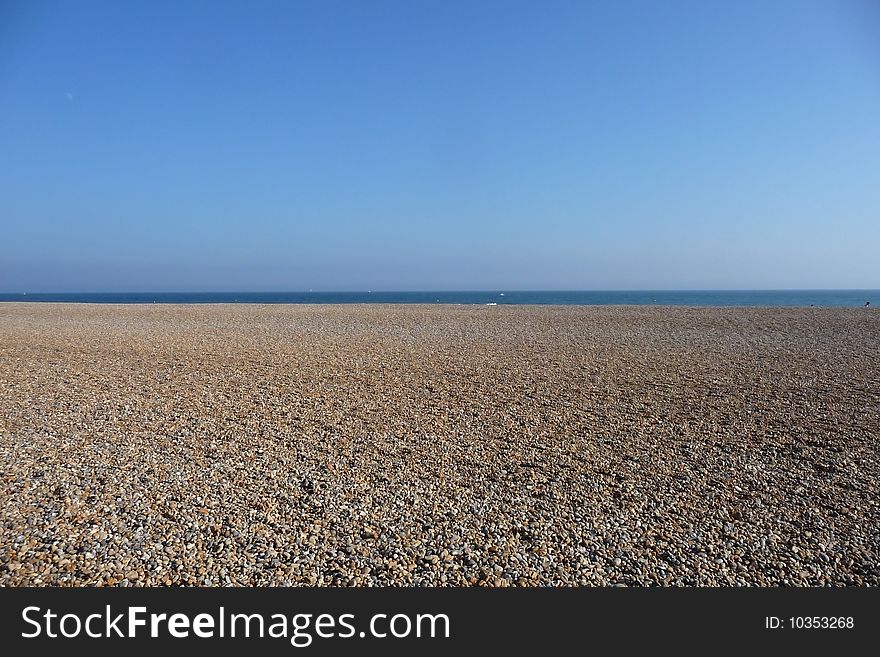 A view of the beach on the coast of Brighton. A view of the beach on the coast of Brighton.