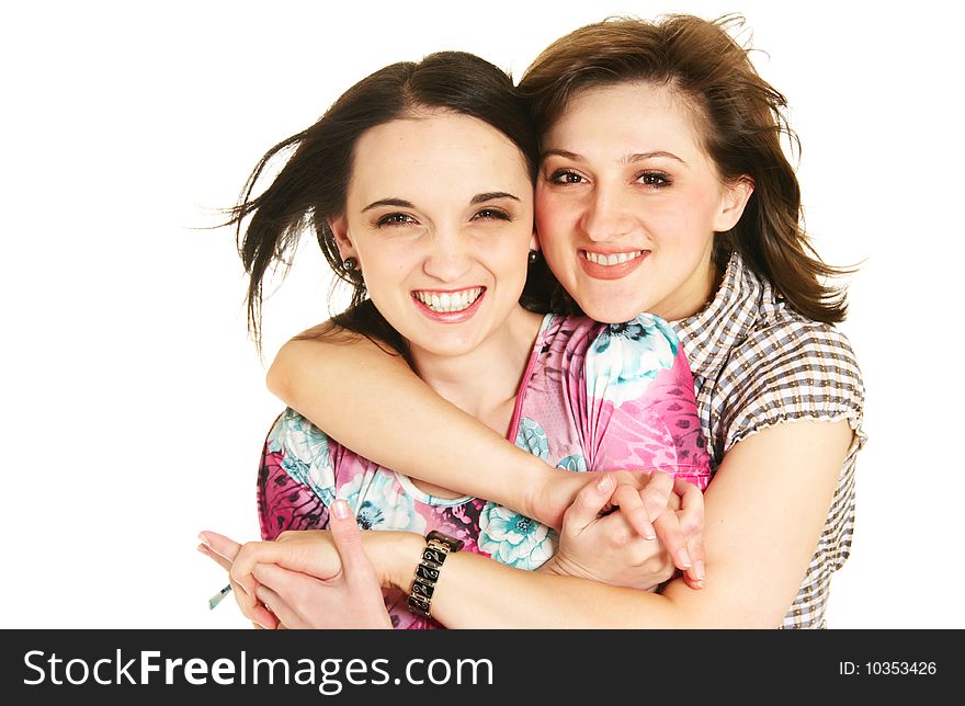 Two happy young sisters or friends