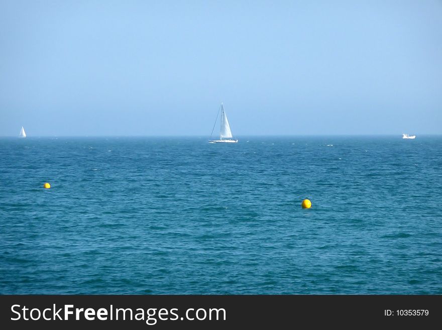 A sail boat just of the Brighton coast. A sail boat just of the Brighton coast.