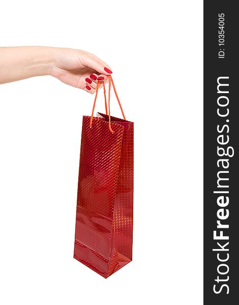 Hand Holding Red Shopping Bag