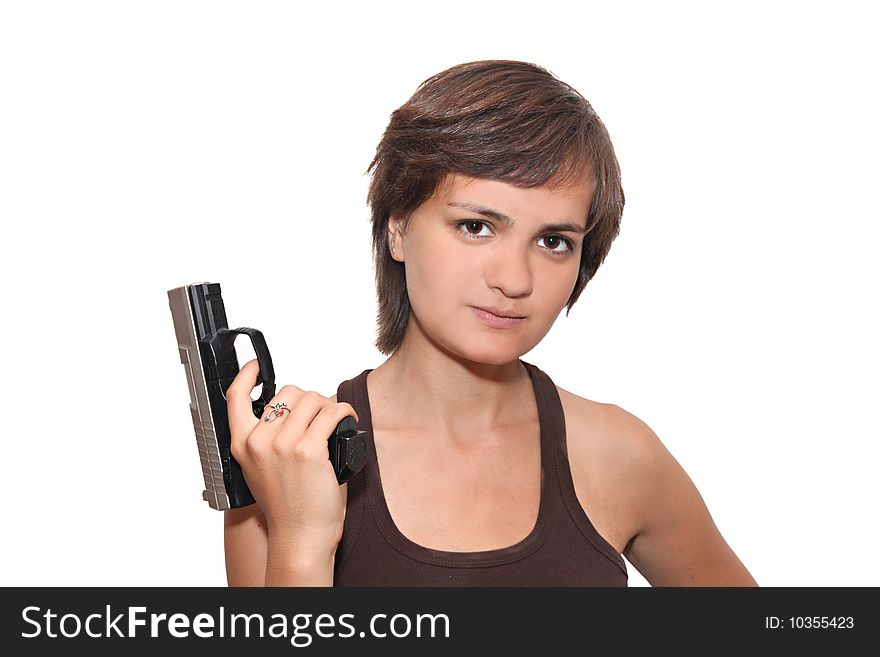 Young girl in a tank top holding handgun. Young girl in a tank top holding handgun