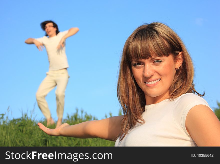 Girl Holds  Guy On  Palm