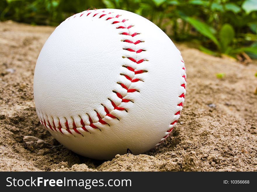 Baseball ball on a grass