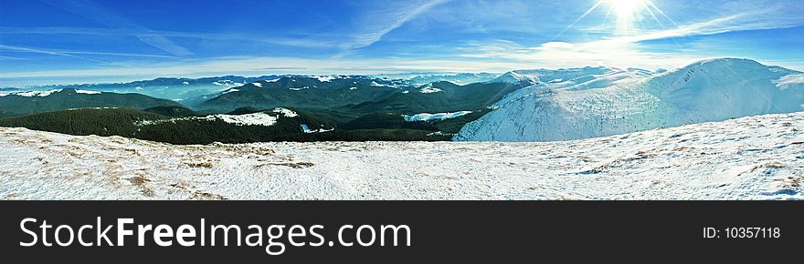 Beautiful snowy mountain peaks on the early winter morning. Beautiful snowy mountain peaks on the early winter morning