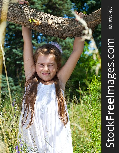 girl  hangs on a tree