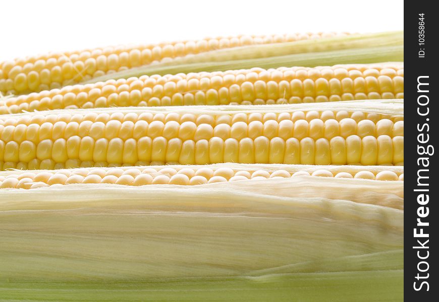 Raw yellow corn closeup background. Raw yellow corn closeup background.