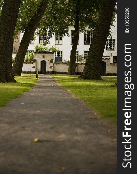 Path leading to a row of ancient houses