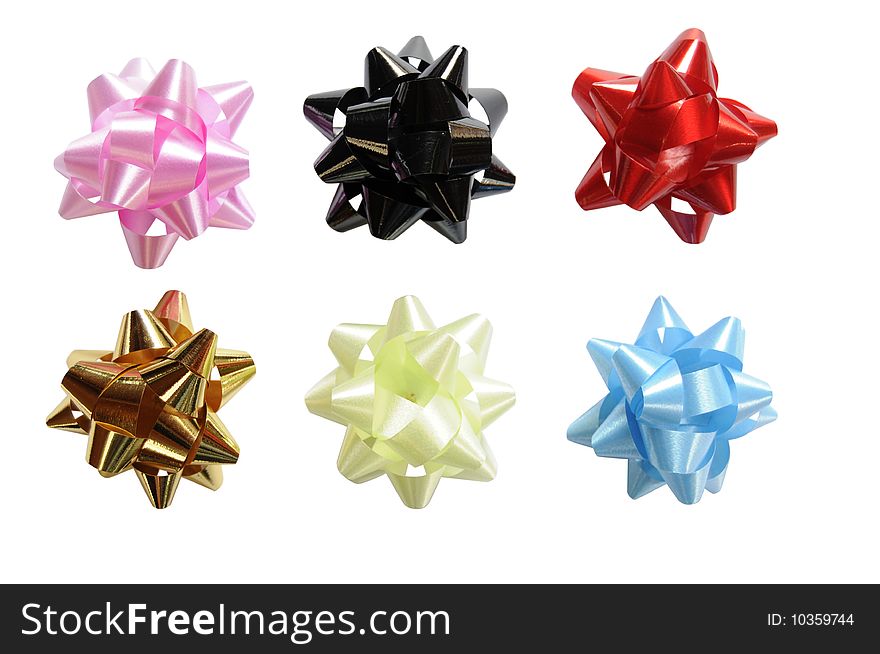 A group of assorted colour gift bows isolated on white.