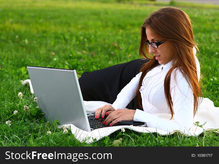 Beautiful Young Woman Studing In Park